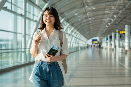 A Japanese lady walking in the airport